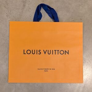 Louis Vuitton Vibrant Orange Shopping Bag with Blue Handles